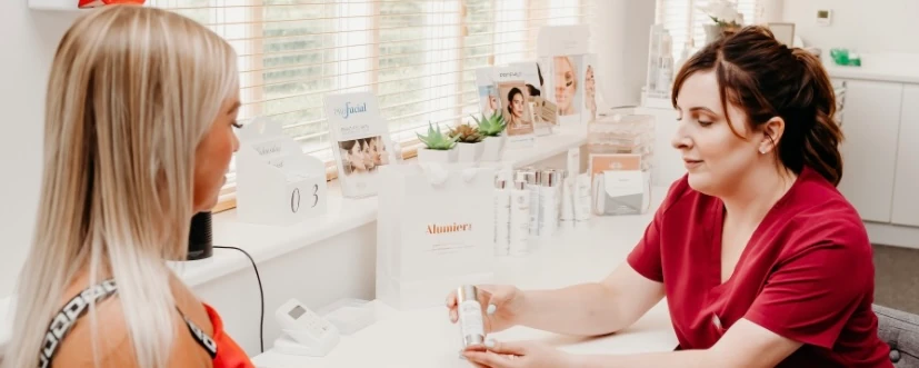 a nurse talking to a patient